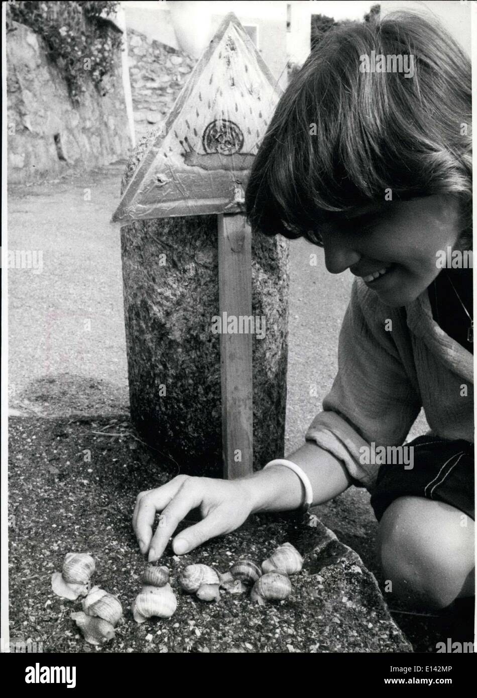 Mar. 31, 2012 - At a snail's pace: move these ''occupants of a house'' fore ward, which are shown here by Claudia. in special times these animals cross the steers of towns in Switzerland in thousands - and naturally many of them ''go to the dogs'' and become dangerous for the car-drivers because of skidding - and now children set up this directional sign to help the animals. The ''broad hint'' shall also induce the motorist to drive at a snail's pace - and he shall show consideration for the animals and not least for himself. Stock Photo