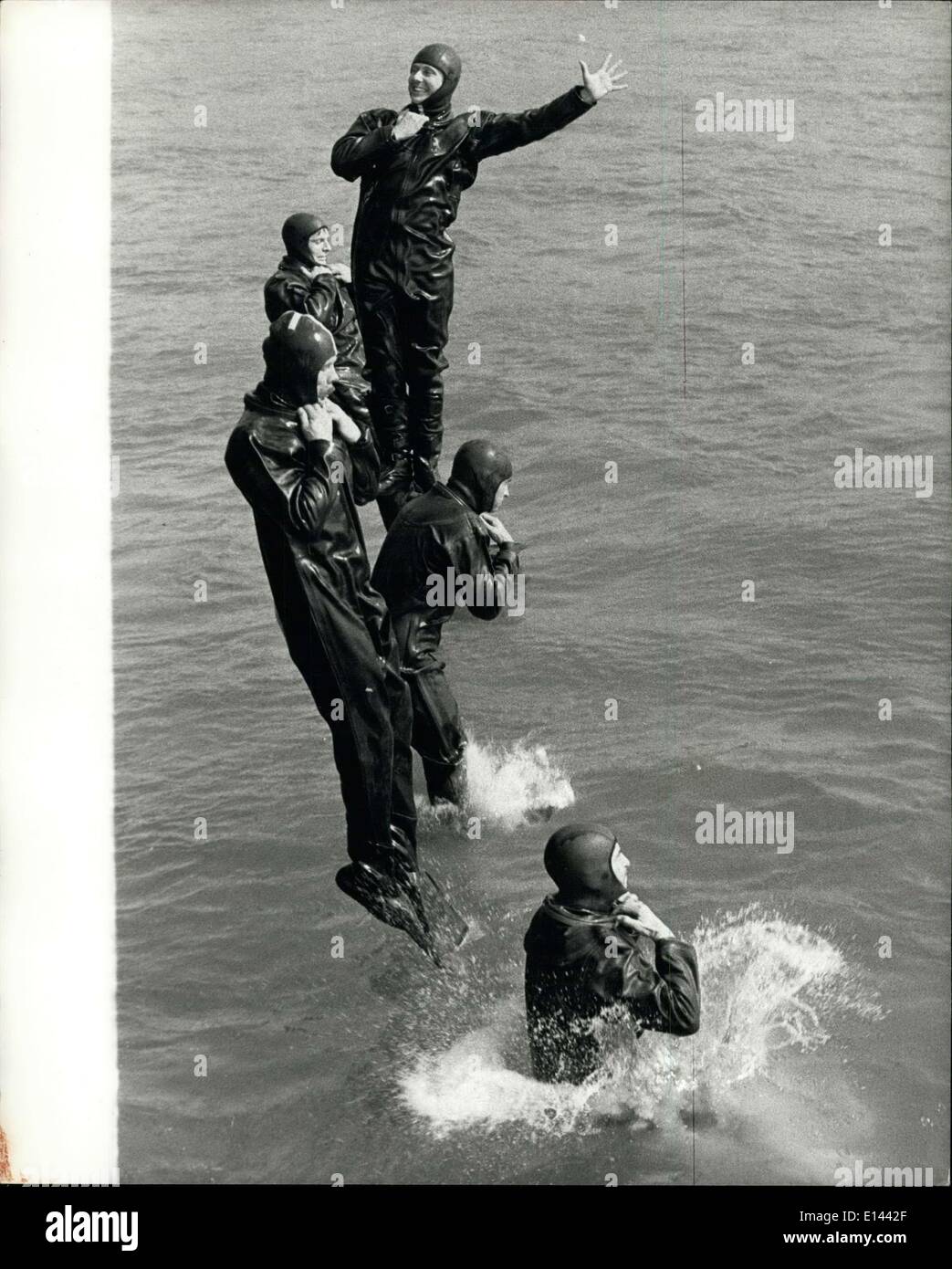 Apr. 04, 2012 - All In The Line Of Duty: Taking the plunge off Southend are members of the Essex Police's 13-man diving team. Marine Inspector Robert George, who heads the Essex force's aqua units, said: ''These men can be called out immediately for diving operations. Each one trains at least once a fortnight. ''They must be able to go off helicopters, boats, bridges and piers''. When they are on dry land the men are engaged in normal police work. Stock Photo