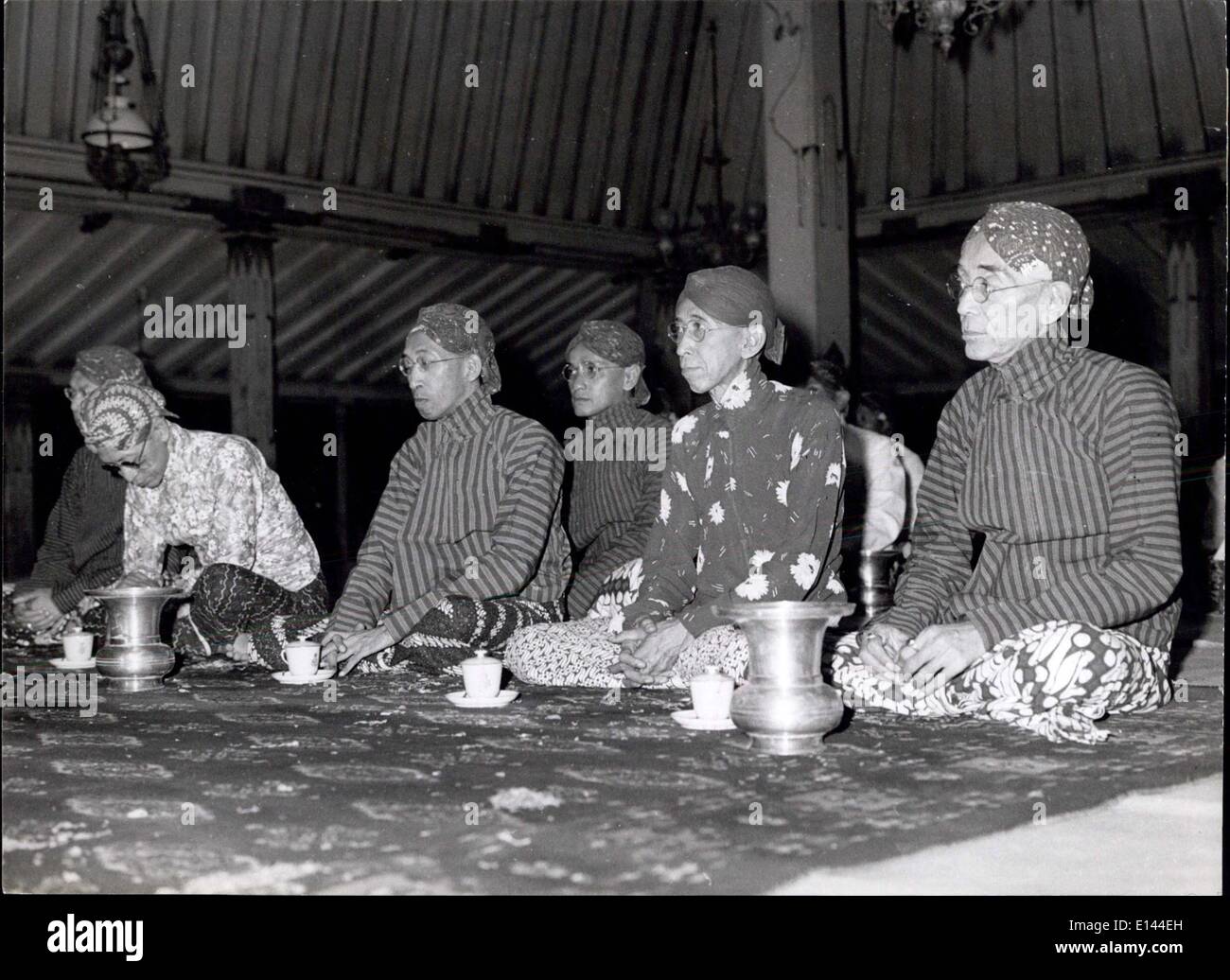 Apr. 04, 2012 - While the ''gamelin'' plays, the Sultan and Princess of Jogjakarta spend the entire night praying in the Royal Mosque, with spitoons and cups of tea nearby. Stock Photo