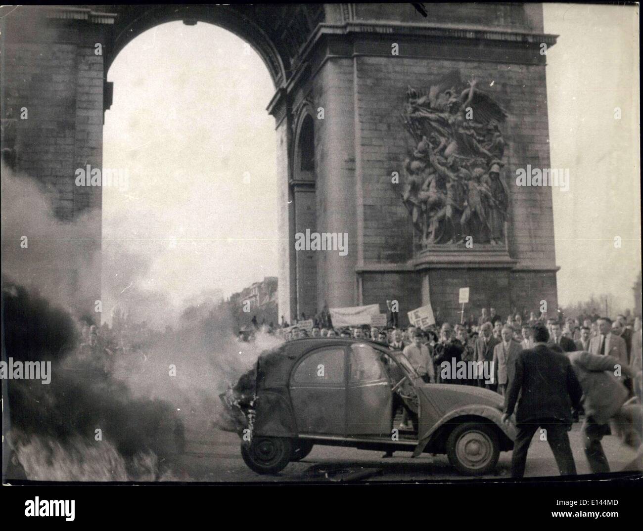 Apr. 04, 2012 - Street riots broke out on the Chamms Elysee's this afternoon after a hand granade was thrown at demonstrators demanding stronger action in Northern Africa. The demonstration was staged by Colonel Bourgoin in Homage of Captain Moureau who was captured by Moroccan rebels and never freed. Different scenes of riots. Stock Photo