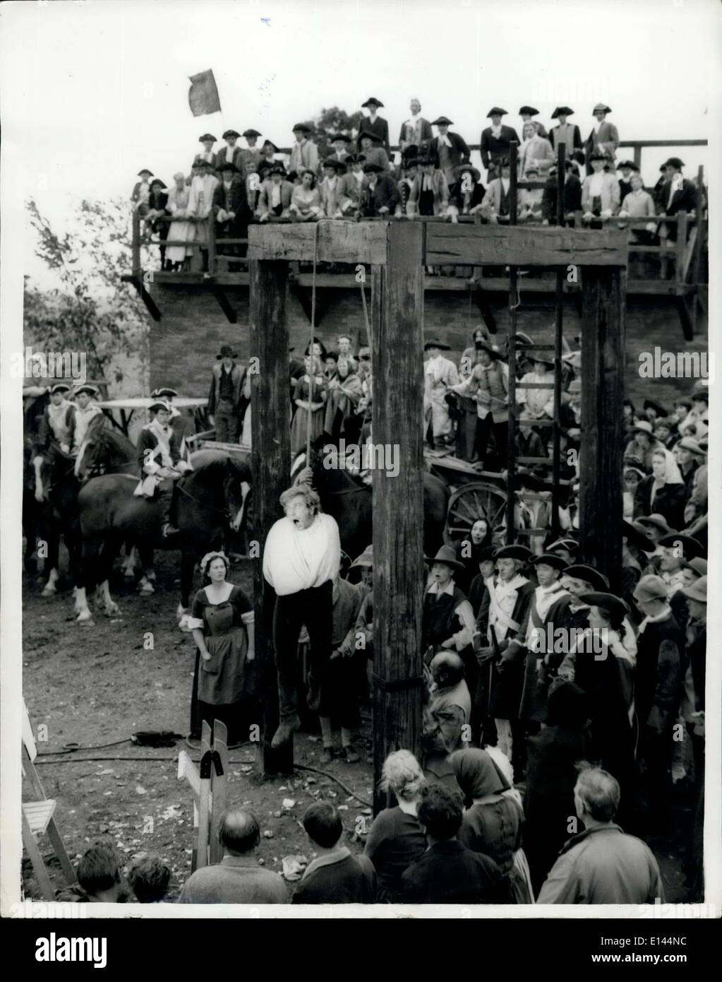 Apr. 04, 2012 - Well, I'M Hanged!: They hanged 1962's brightest star yesterday: Albert Finney, to the Tyburn of 1745. But it wasn't Marble Arch; it was Bridgeport, Dorset. And they were only making a film of Henry Fielding's classic ''Tom Jones''. Albert was strung up - and then, true to the tale, rescued by a horseman with a knife and rides away to freedom and his love. The film costs half a million pounds to produce, Quite an expensive way to half-hang an actor of such promise Stock Photo