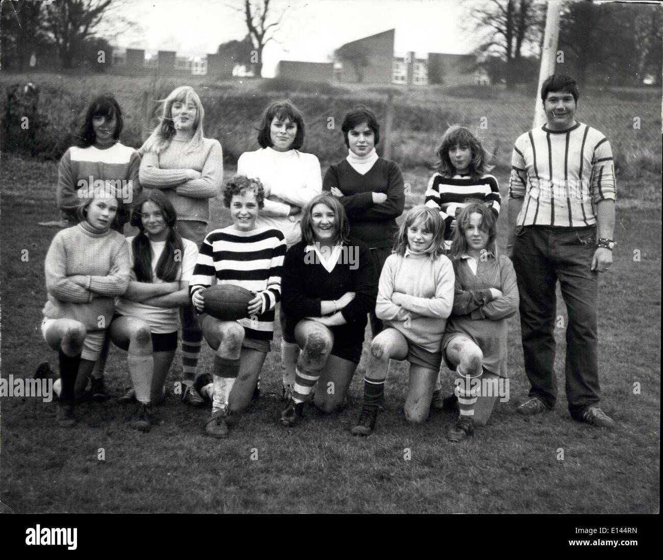 Apr. 04, 2012 - Part of the country's first all-girl rugger team - from Daventry Mixed Youth Club - with their male trainer, Roland Jordan. Stock Photo
