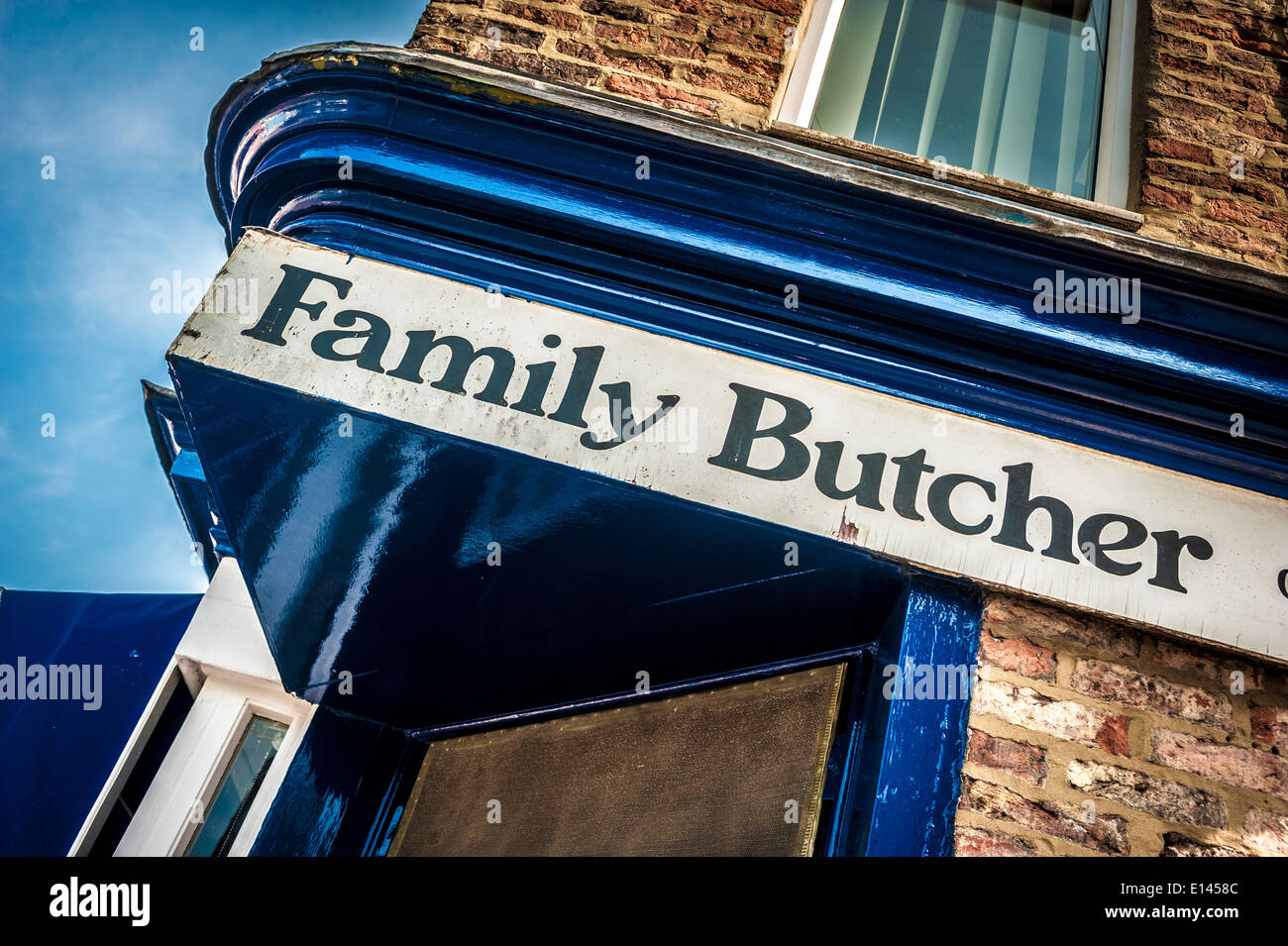 Family Butcher sign above shop doorway Stock Photo