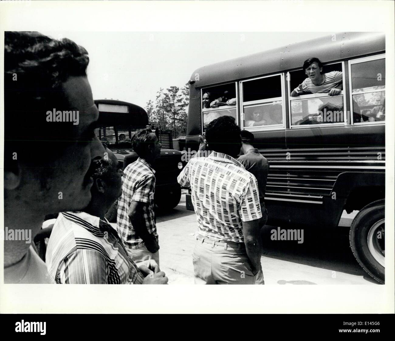 Apr. 04, 2012 - Newly arriving Cuban refugee talk to refugees already processed at the tent city in the Fort Walton Beach fairgrounds/Eglin Air Base. Stock Photo