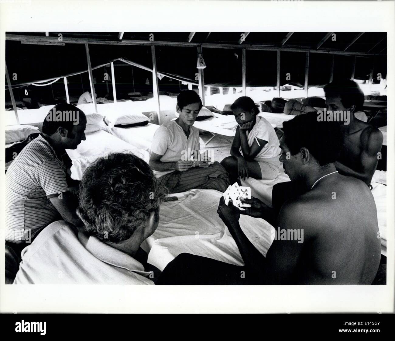 Apr. 04, 2012 - Cuban refugees pass the time in the tent city in Ft. Walton Beach by playing cards. Stock Photo