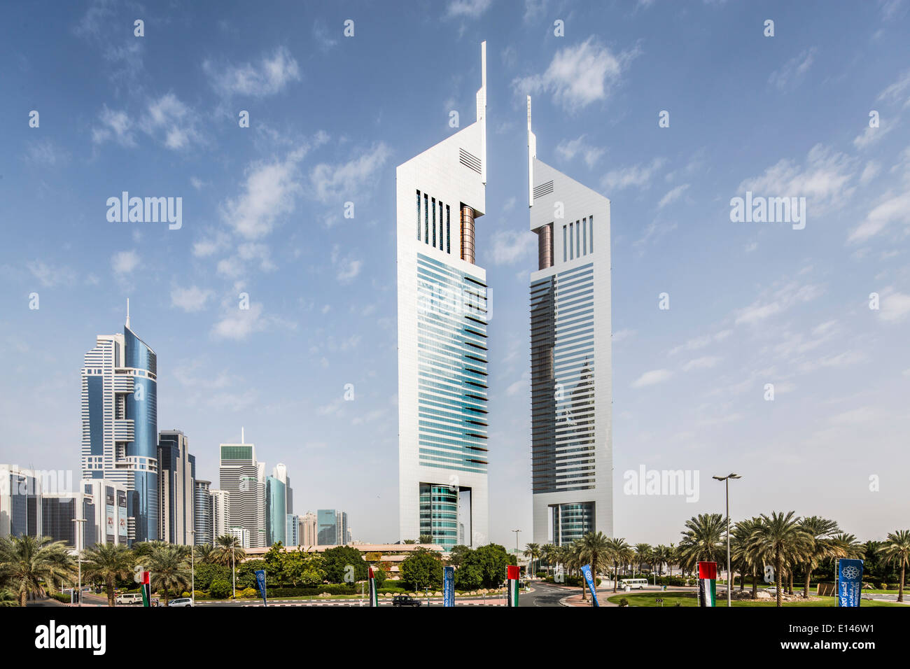 United Arab Emirates, Dubai, Highrise buildings near Sheikh Zayed Road in financial city center. Right Emirates Financial Towers Stock Photo