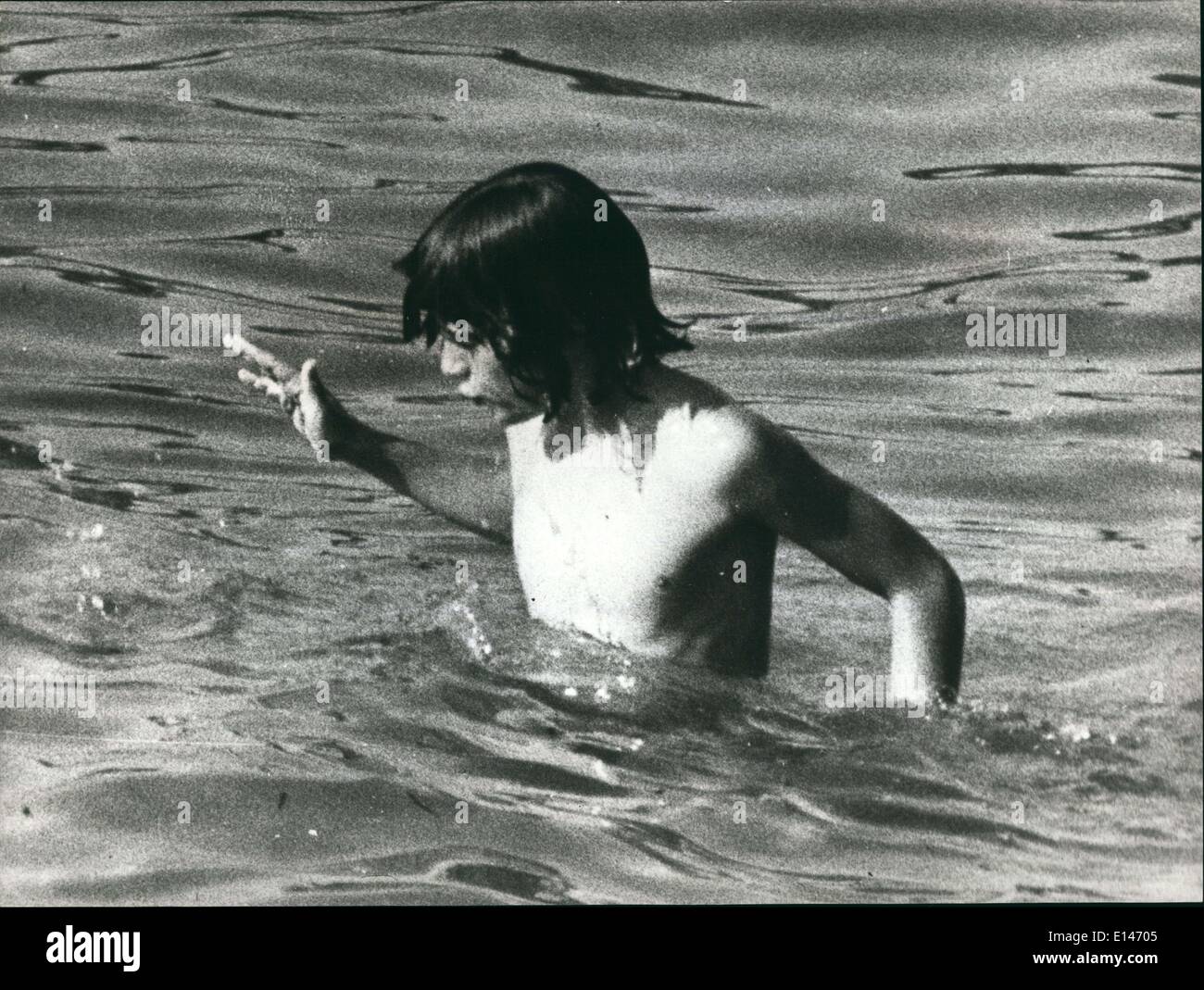 Apr. 16, 2012 - John- John Kennedy, the son of the late President emerges from the water during a swim off the Greek coast. Stock Photo