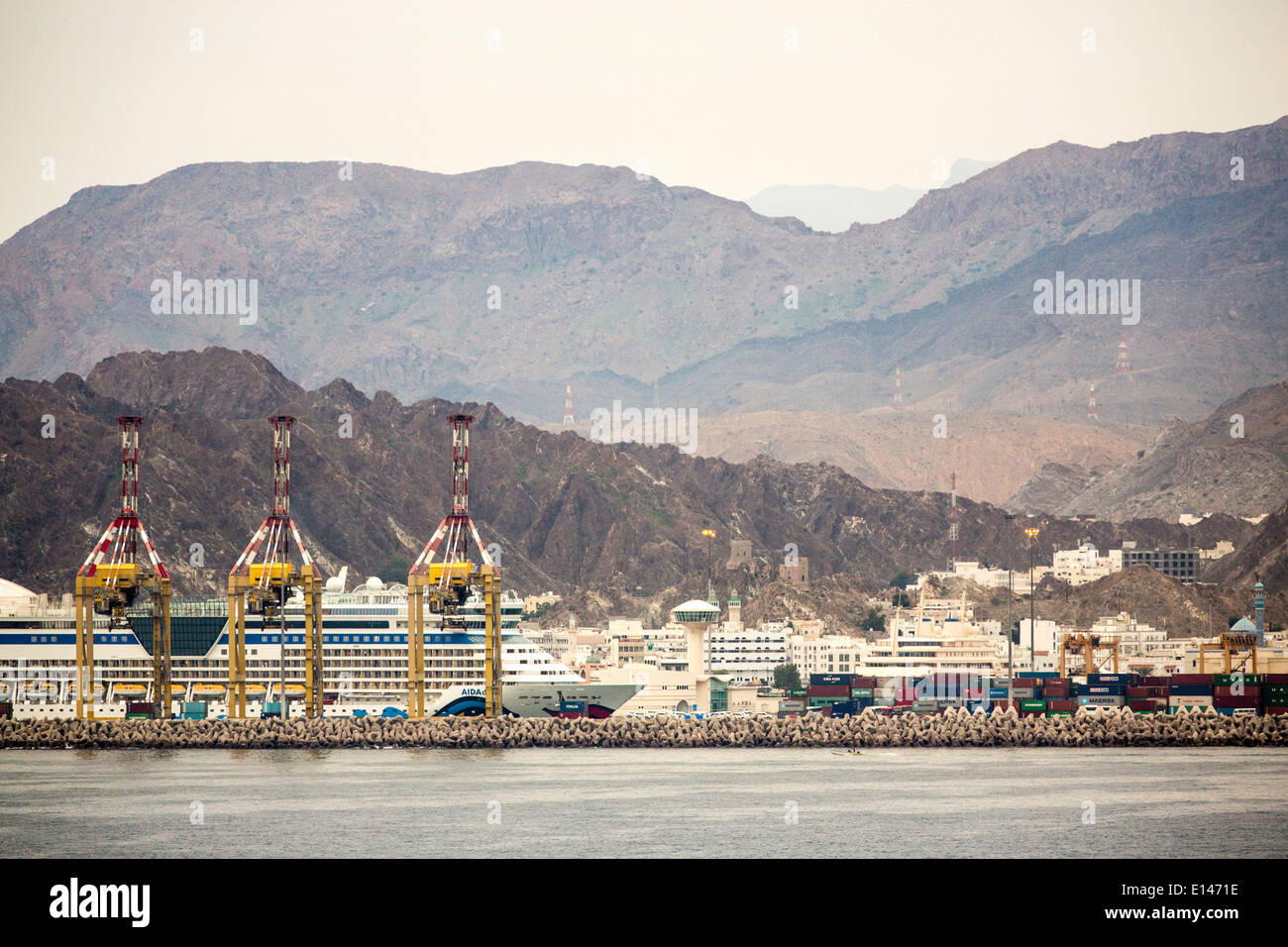 Oman, Muscat, Harbor Mina As Sultan Qaboos. Aida cruise ship Stock Photo