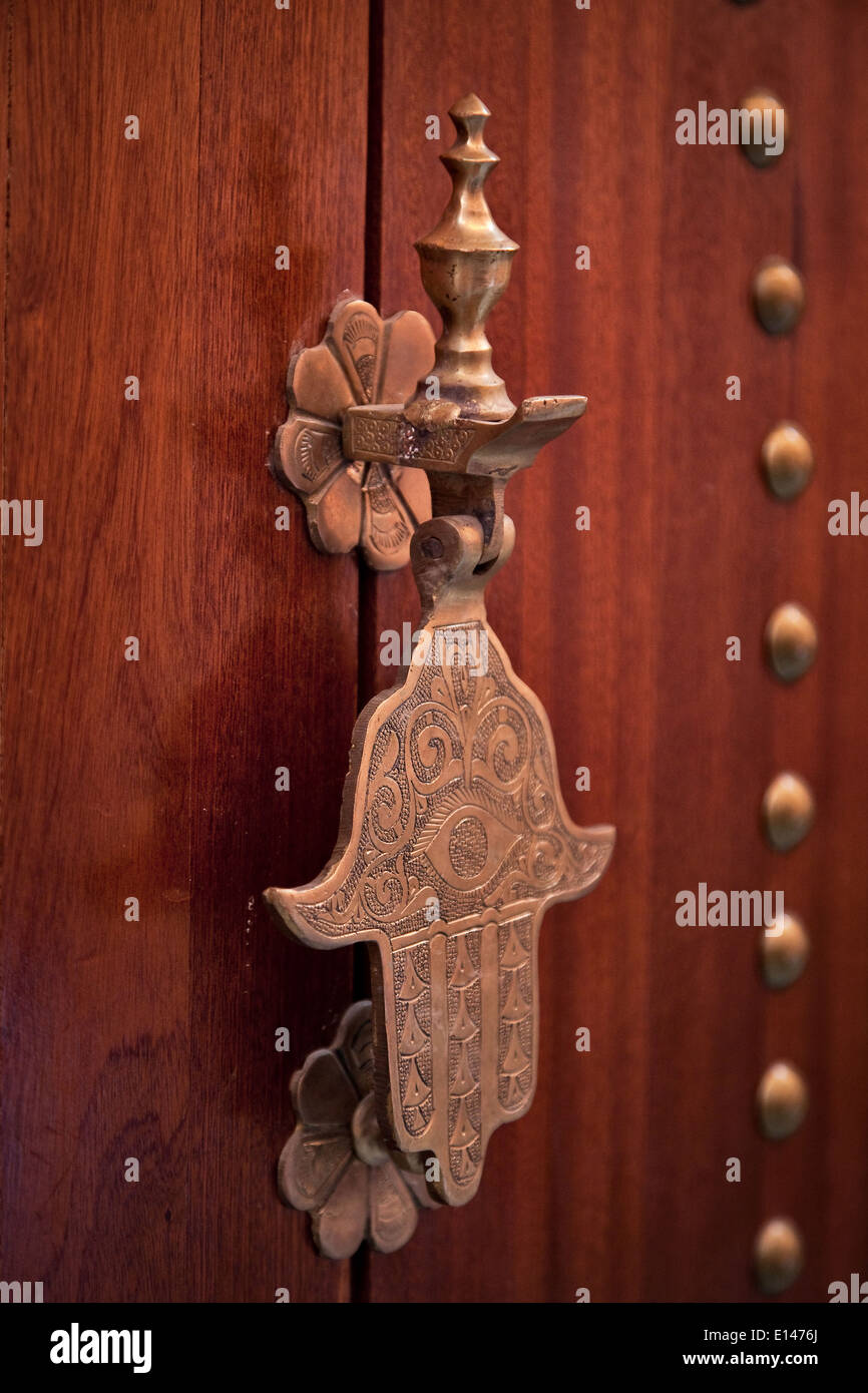 Handle door with Arabic decorations in the Medina of Marrakech, Morocco