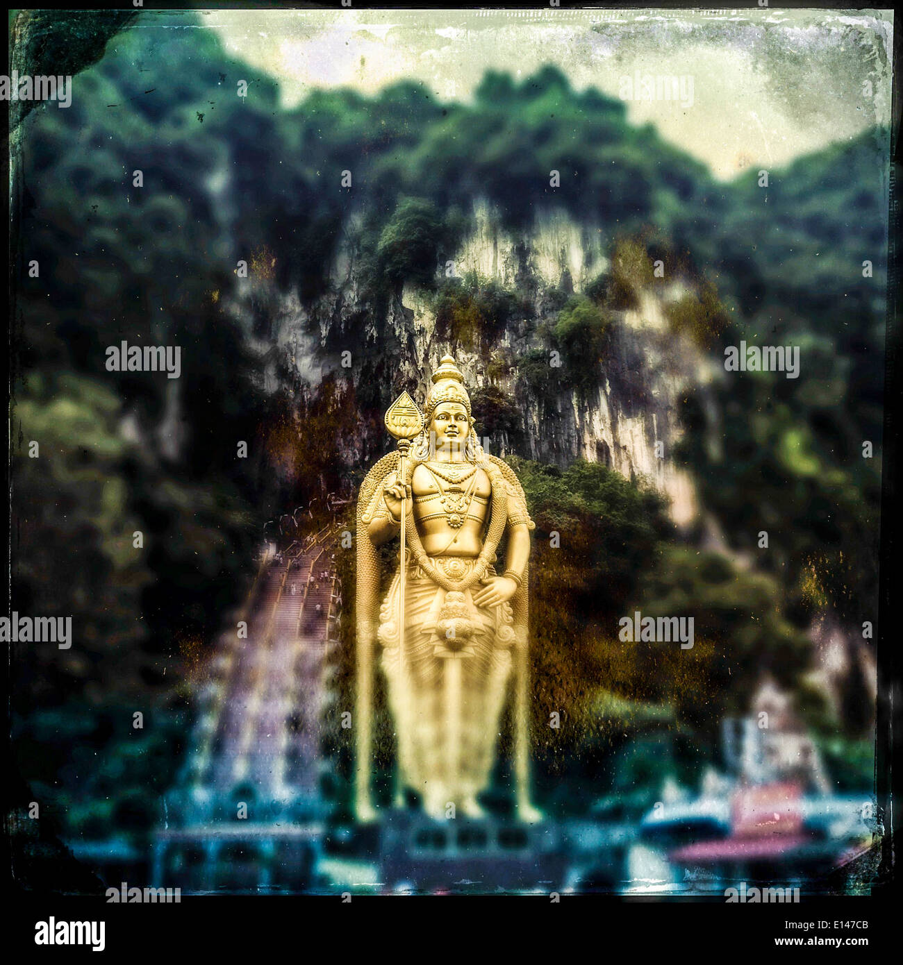 Golden statue at Batu Caves, Selangor, Malaysia - Smartphone Captured Stock Image