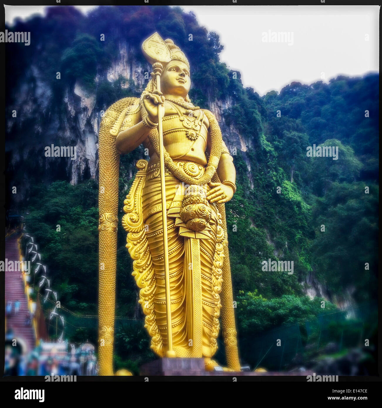 Golden statue at Batu Caves, Selangor, Malaysia - Smartphone Captured Stock Image