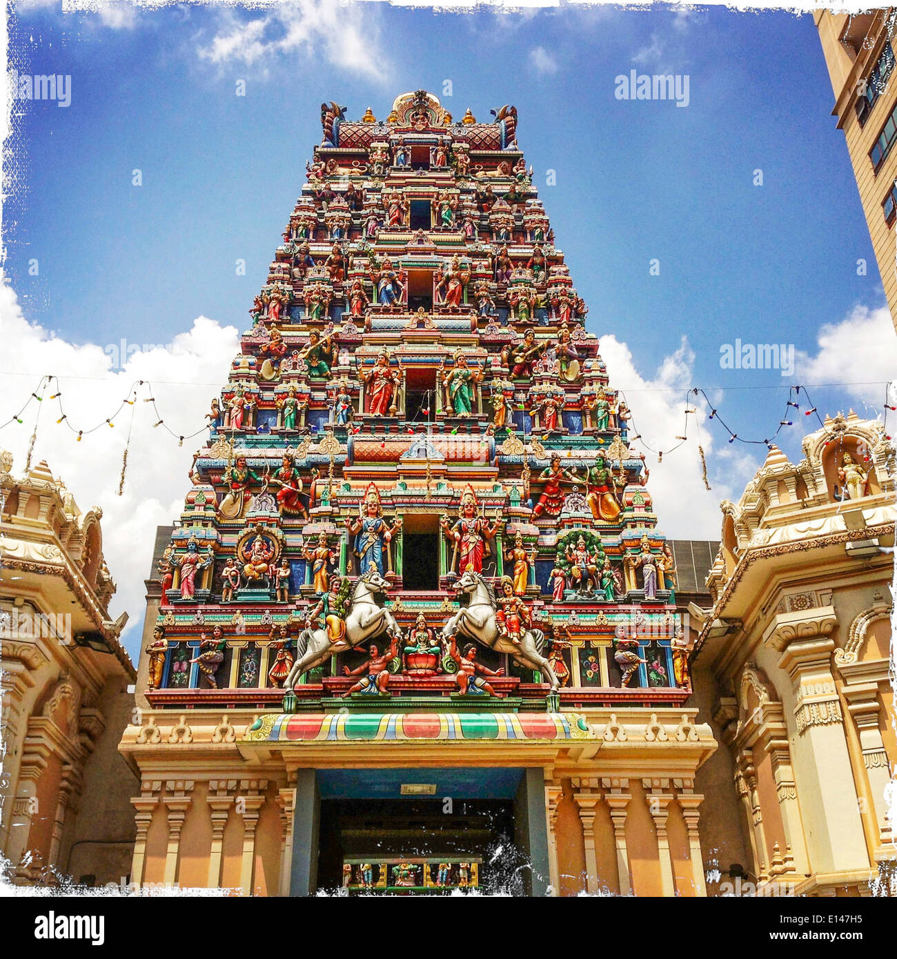 Sri Mahamariamman temple under blue sky, Kuala Lumpur, Malaysia - Smartphone Captured Stock Image