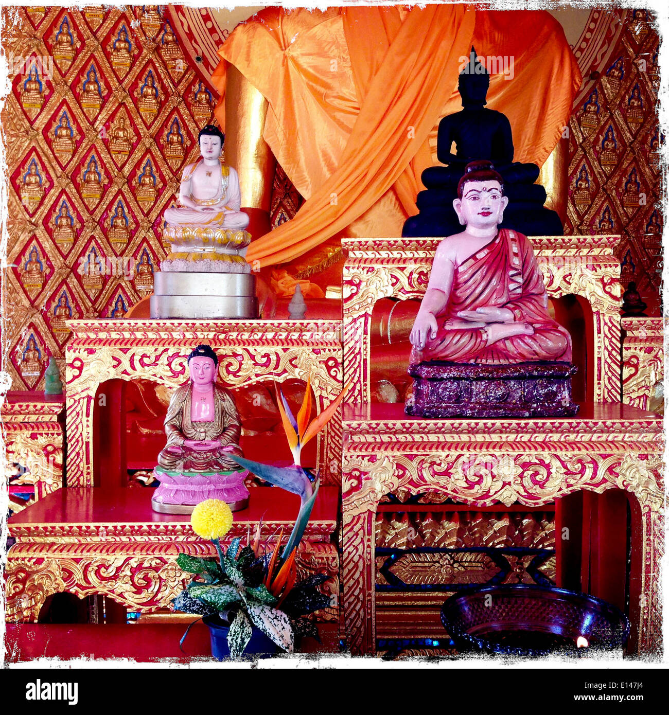 Ornate Buddha statues in temple, Wat Chayamangkalaram, Penang, Malaysia - Smartphone Captured Stock Image