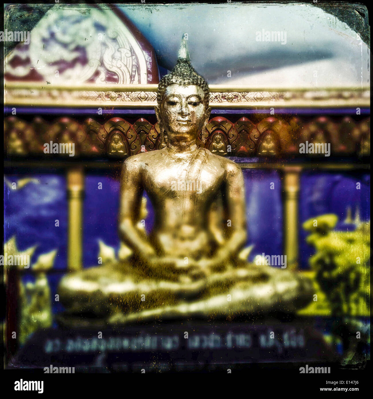Golden Buddha statue in ornate temple, Wat Chayamangkalaram, Penang, Malaysia - Smartphone Captured Stock Image