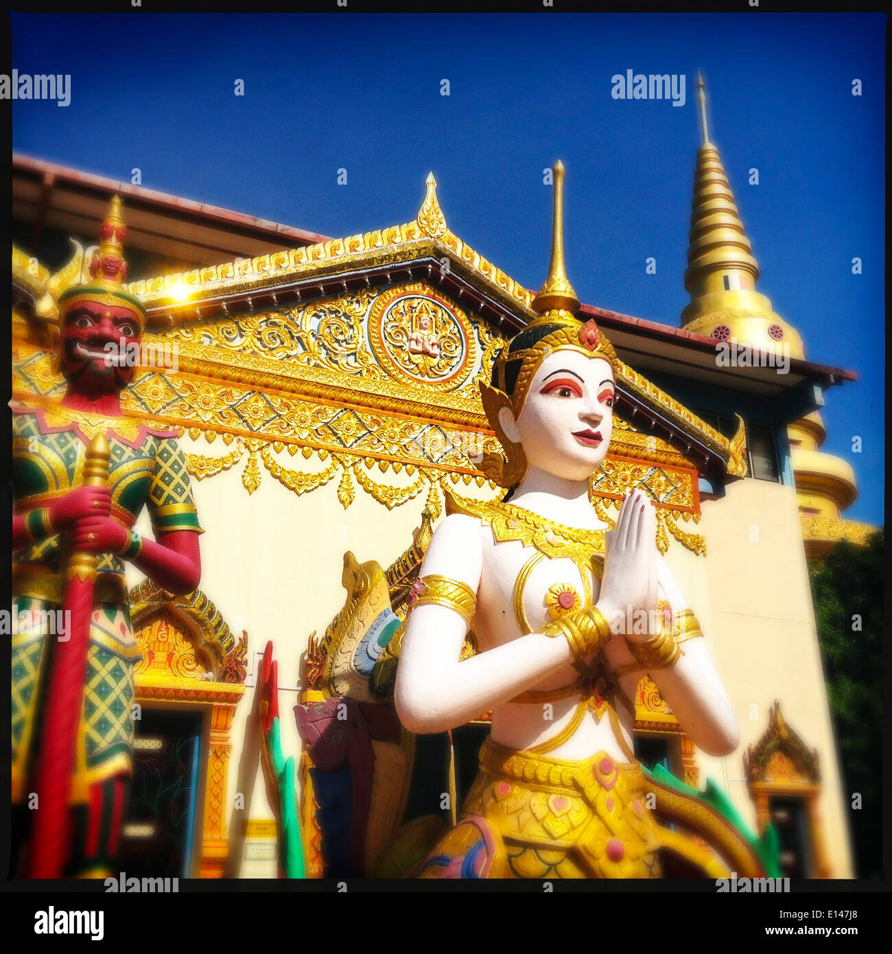 Statues outside Golden Buddha statue in Wat Chayamangkalaram temple, Penang, Malaysia - Smartphone Captured Stock Image