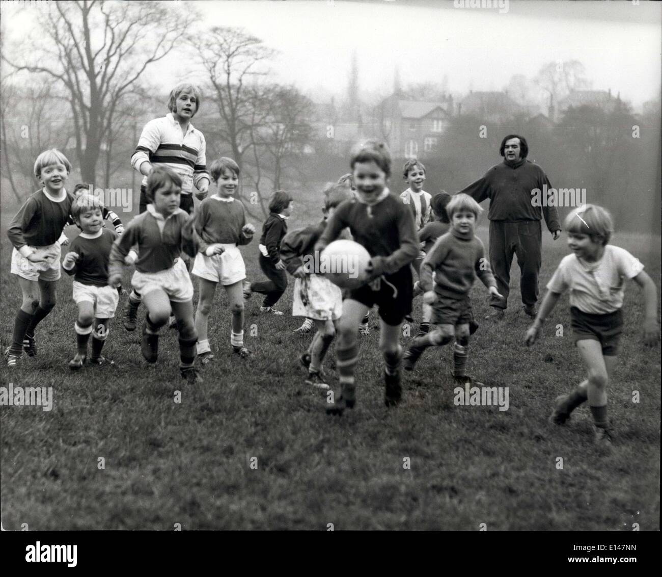 Apr. 17, 2012 - Six-year-old Andrew Brown leads the field. In the background are Huddersfield full-back Peter Fitton, left, and Stock Photo