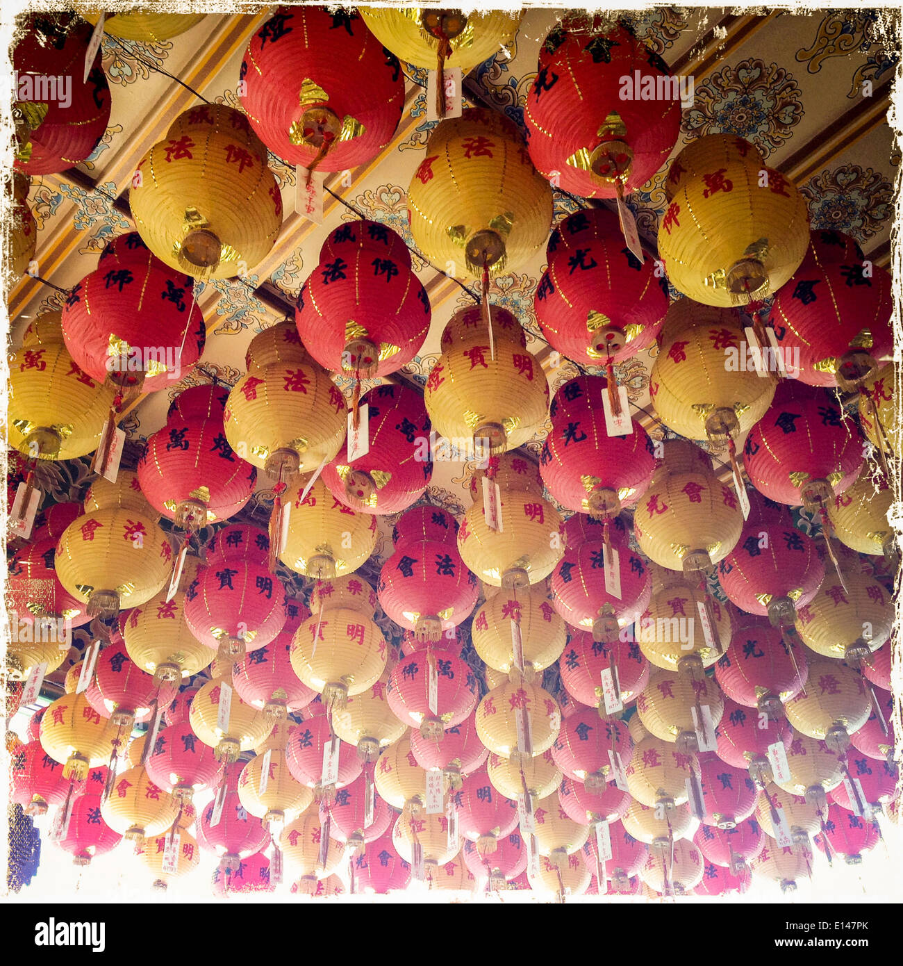Traditional Chinese New Year paper lanterns hanging from ceiling - Smartphone Captured Stock Image
