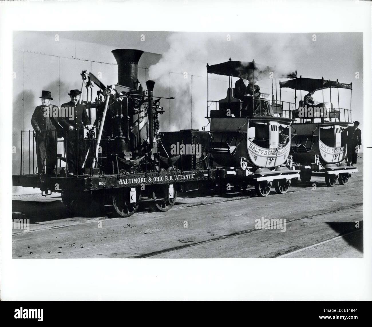 Apr. 17, 2012 - Birthday of a Memorable Achievement: Centennial of transcontinental railroad link-up in U.S: Identifying caption: Double-decked Imlay coaches pulled by a ''grasshopper'' steam engine were first to enter Washington, D.C., 1835. Stock Photo