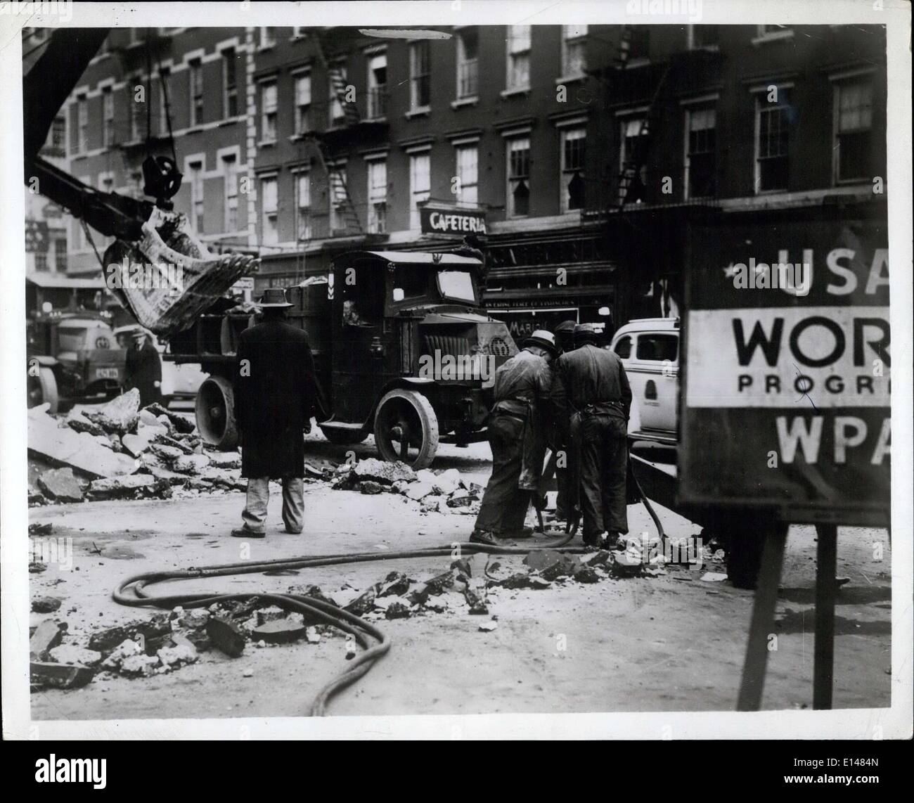 Apr. 17, 2012 - The Roosevelt administration created many jobs for the unemployed during the depression. Photo shows WPA workers repairing New York street. Stock Photo