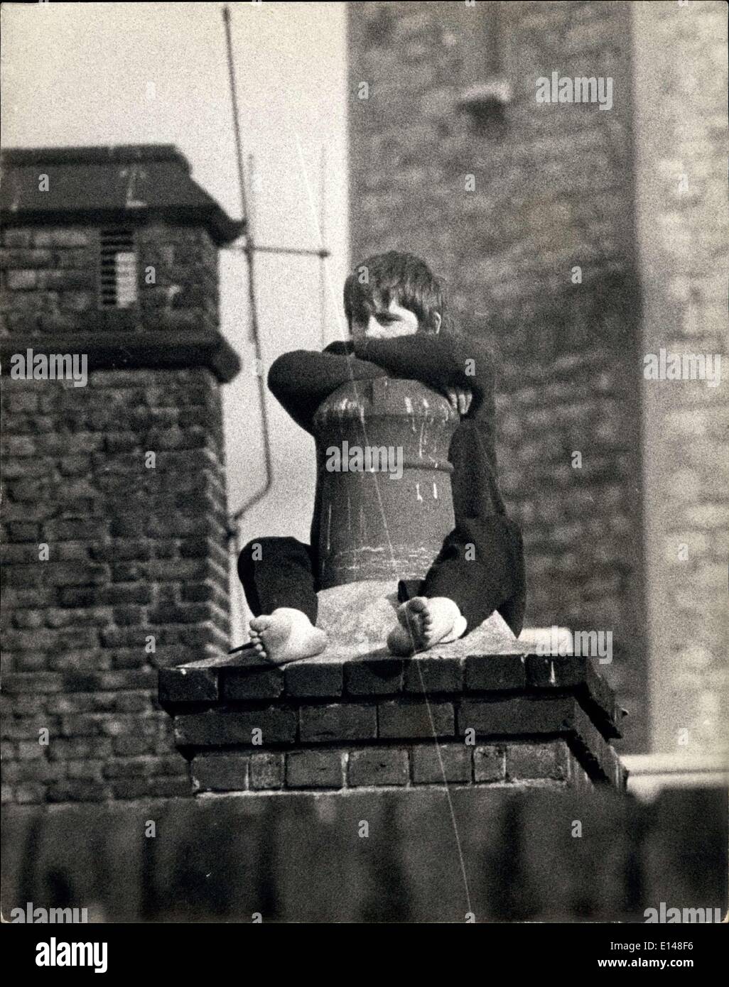 Apr. 17, 2012 - GIRL PRISONER AT HOLLOWAY PRISON STAGES HER SECOND ROOFTOP PROTEST: Girl prisoner, Pat Breslin, 18, who is serving a sentence of nine months at Holloway Prison for shoplifting, staged her second protest in a week yesterday. Today, after staying overnight perched on the roof beside a chimney stack, she was still refusing to be coaxed down by prison officers. Last week, the girl spent 12 hours on the same roof in a protest about food and conditions. This time she is protesting because she sees that she is being moved to a top security wing at the prison Stock Photo