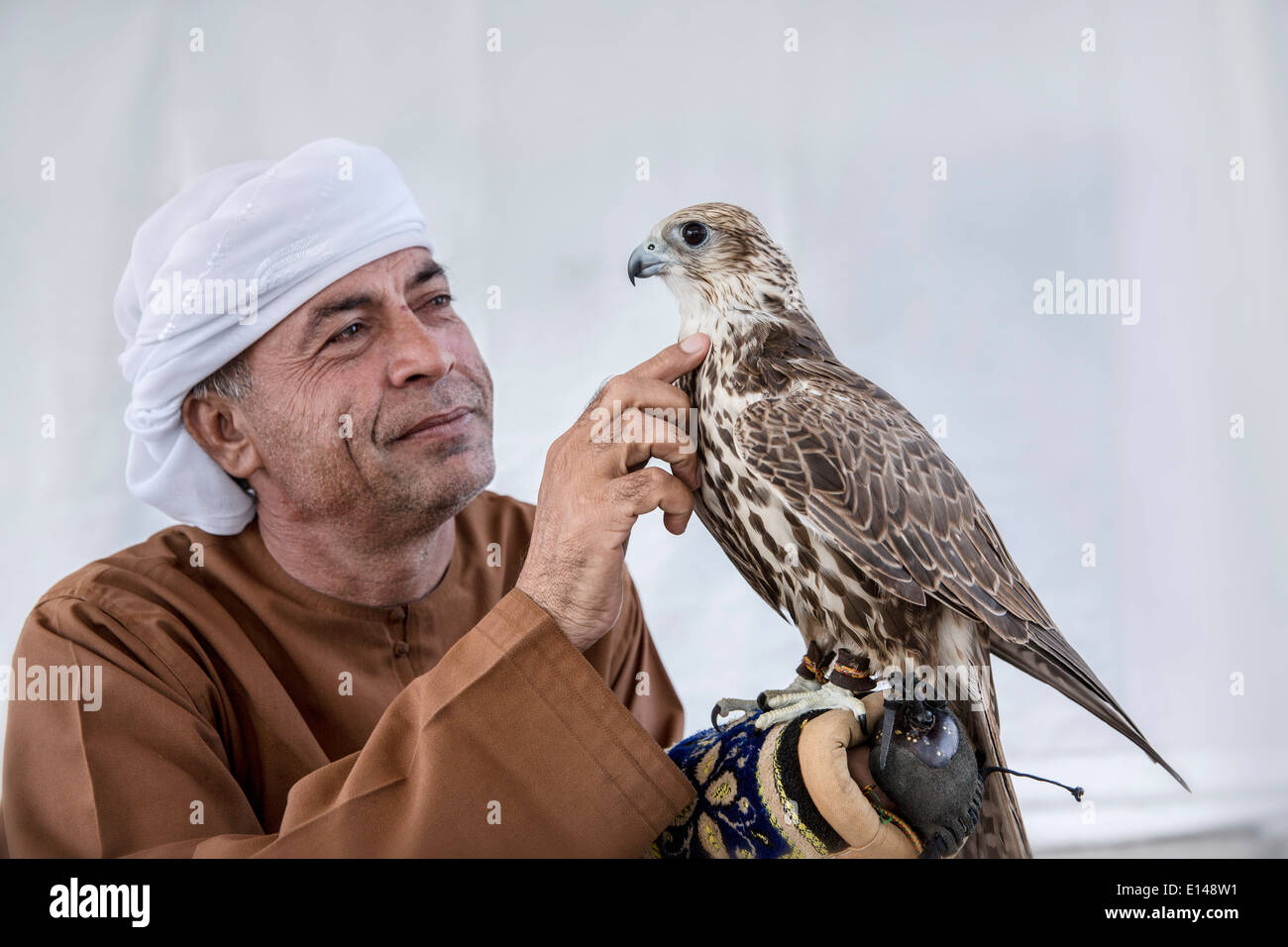 United Arab Emirates,  Abu Dhabi, Falconer with falcon Stock Photo