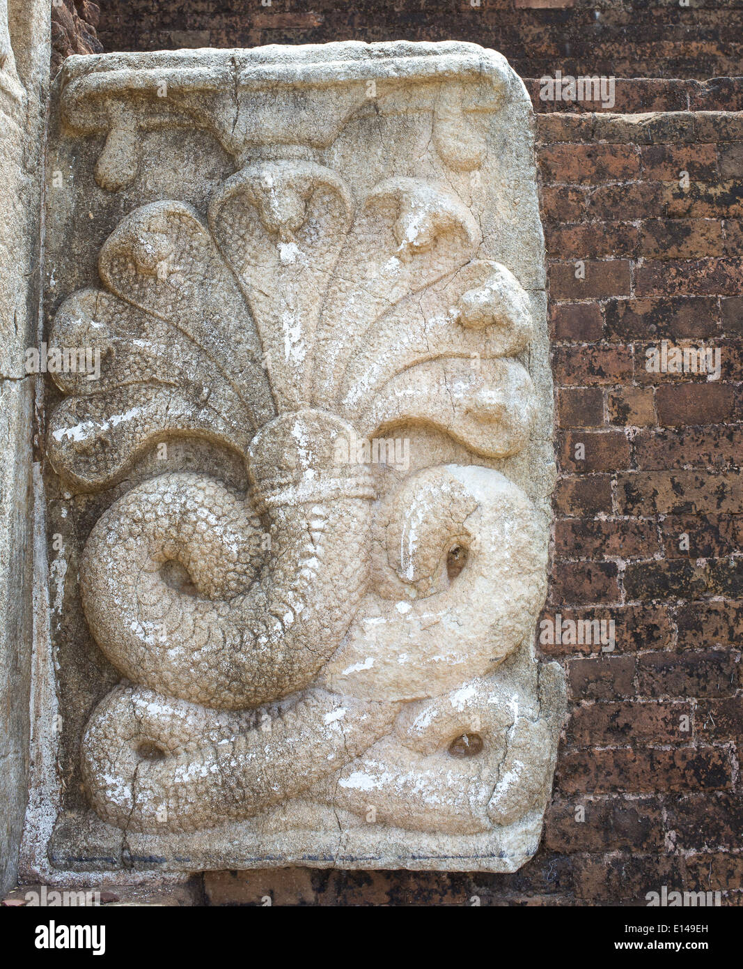 Bass relief of a Seven-headed cobra guardstone Stock Photo