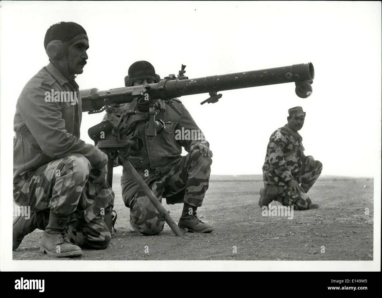 Apr. 17, 2012 - Three members of PLO firing from a 106 mm gun during the maneuvers held in live ammunition. Stock Photo