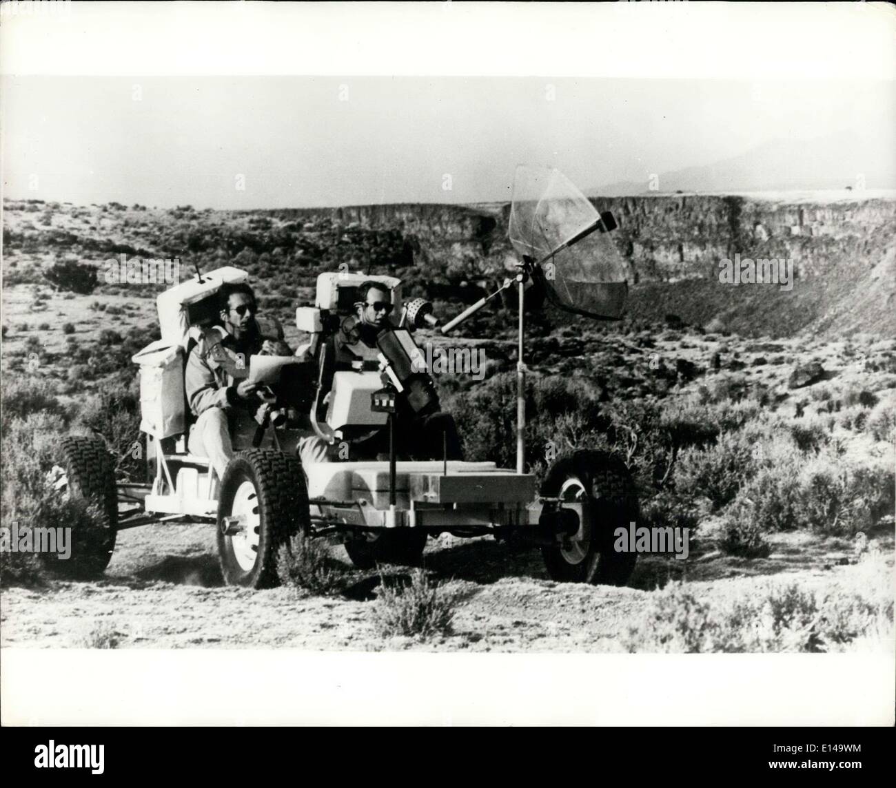 Apr. 17, 2012 - Buggy ride on the moon: James B. Irwin left and David R. Scott, Apollo 15 astronauts, try out a vehicle simila Stock Photo
