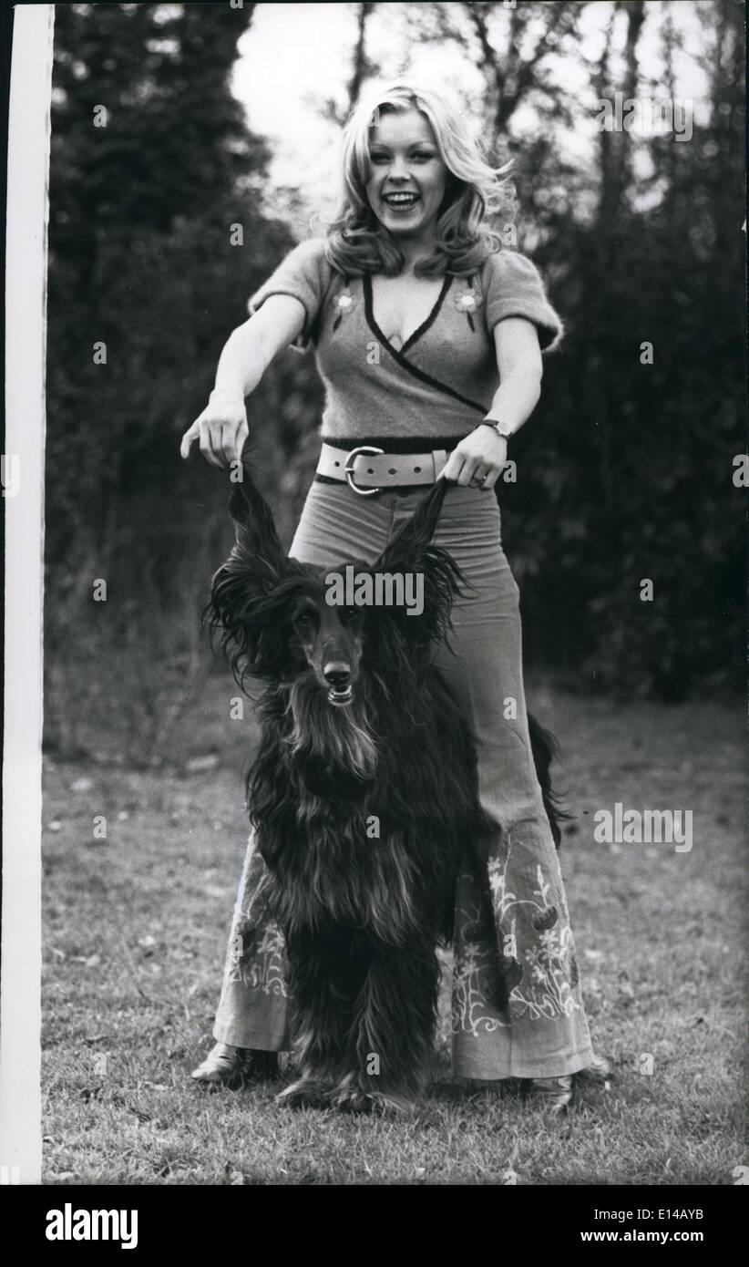 Apr. 17, 2012 - A New Year Delight: Lovely Lena Skoog Hails in the New Year with the help of her pet Afghan hound. An actress/model, Lena, who comes from Sweden, is sure to be a sucess on the pin-up parade in 1973. Stock Photo