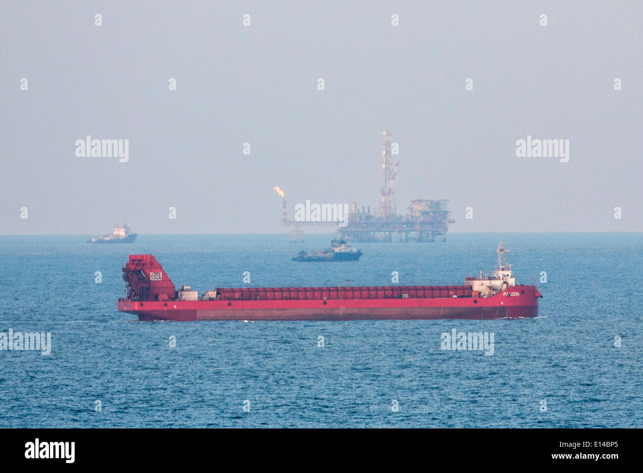 United Arab Emirates,  Abu Dhabi, Oilrig and chemical tanker Stock Photo