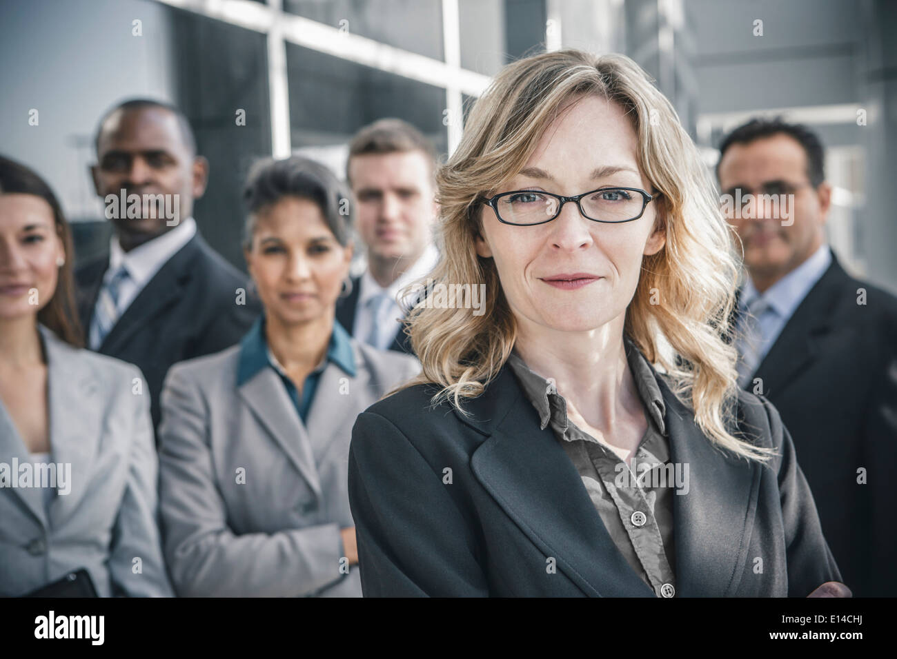 Business people smiling outdoors Stock Photo