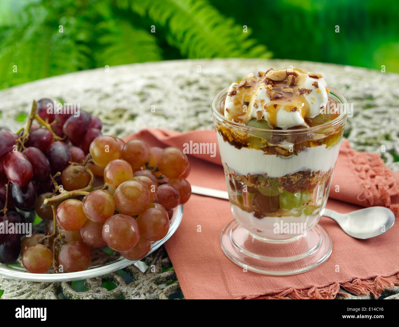 Cardamoms almond yogurt parfait fruit dessert Stock Photo