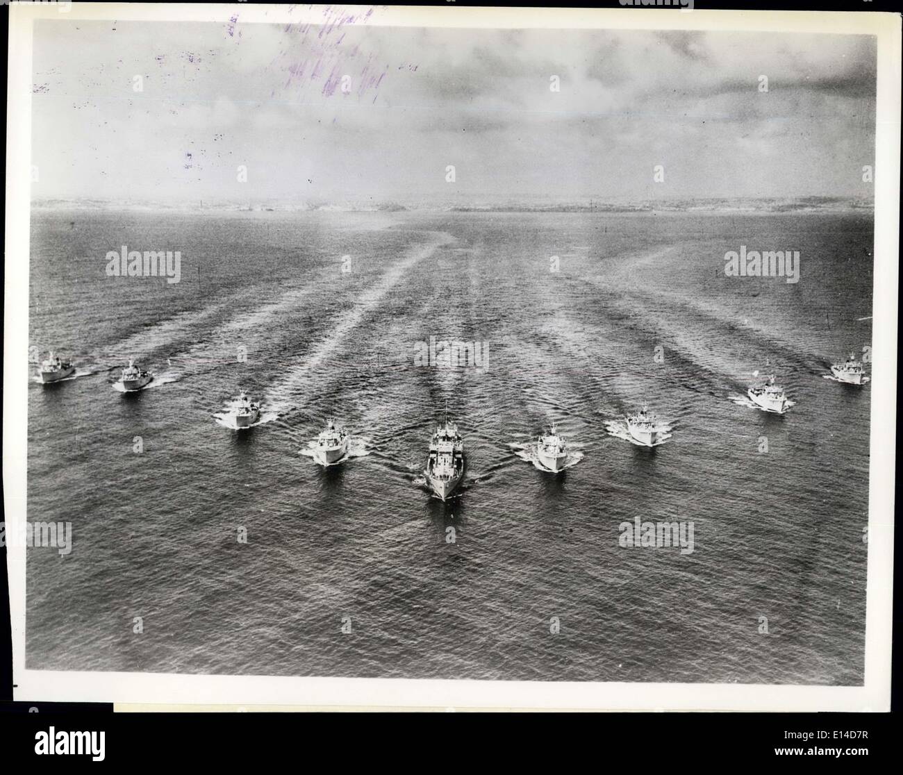 Apr. 17, 2012 - Clean Sweep Of War's Aftermath: H.M.S. Woodbridge Haven (centre) support ship, leads eight coastal minesweeper of the British Navy's Far East Fleet from a sweep of 20-year-old mines in potential shipping lanes of North Borneo. In a two-weeks task aimed at aiding an expanding timber trade, they widened safe channels between Borneo and the Philippines and opened Paitan Bay,m unsafe to shipping since World Wat II. Stock Photo