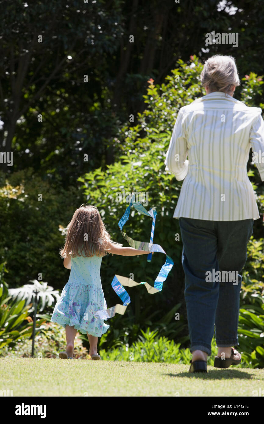 Rear view mature woman playing hi-res stock photography and images - Alamy
