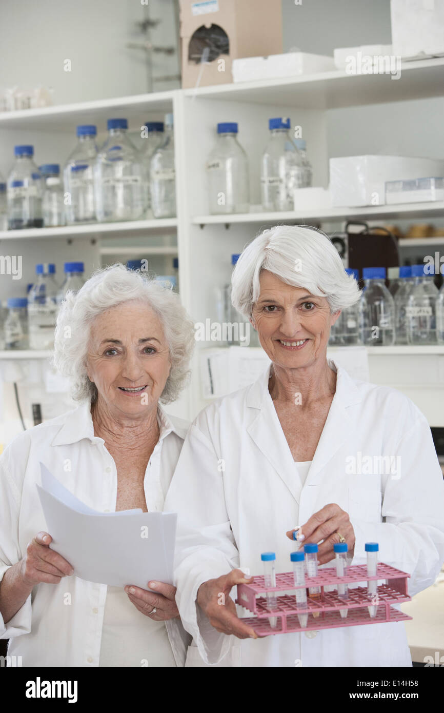 Senior Caucasian scientists working in lab Stock Photo