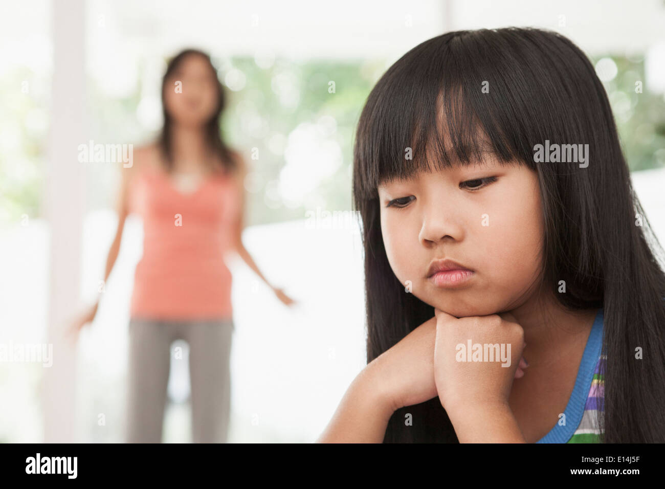 Girl sitting on hands hi-res stock photography and images - Alamy