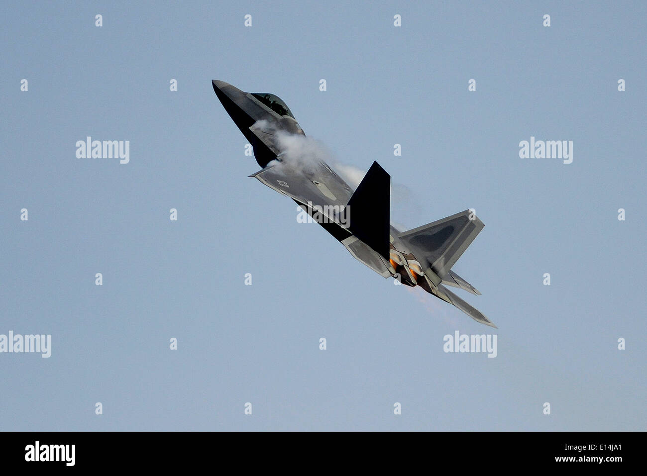 A US Air Force F-22 Raptor stealth fighter aircraft during an aerial demonstration May 21, 2014 at Langley Air Force Base, Virginia. Stock Photo