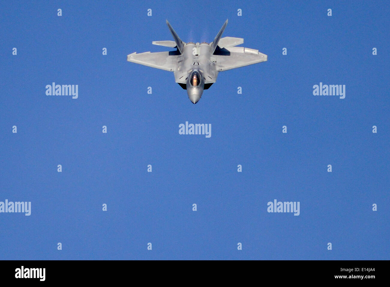 A US Air Force F-22 Raptor stealth fighter aircraft during an aerial demonstration May 21, 2014 at Langley Air Force Base, Virginia. Stock Photo