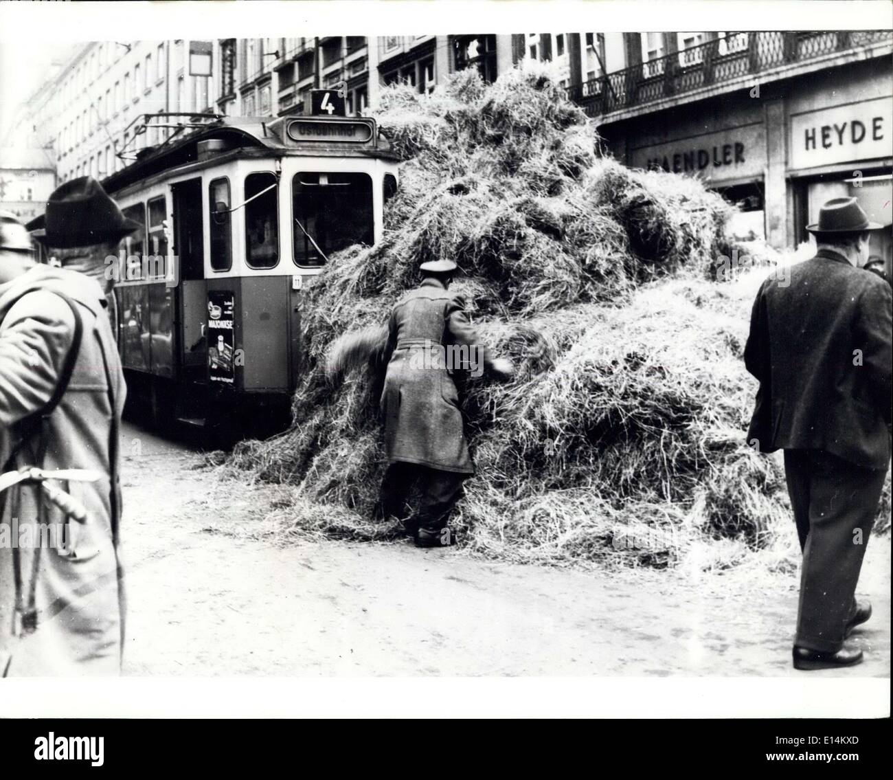 Apr. 05, 2012 - The hay-lay for rams in Munich recently when a lorry overturned its load on to the tracks. Stock Photo