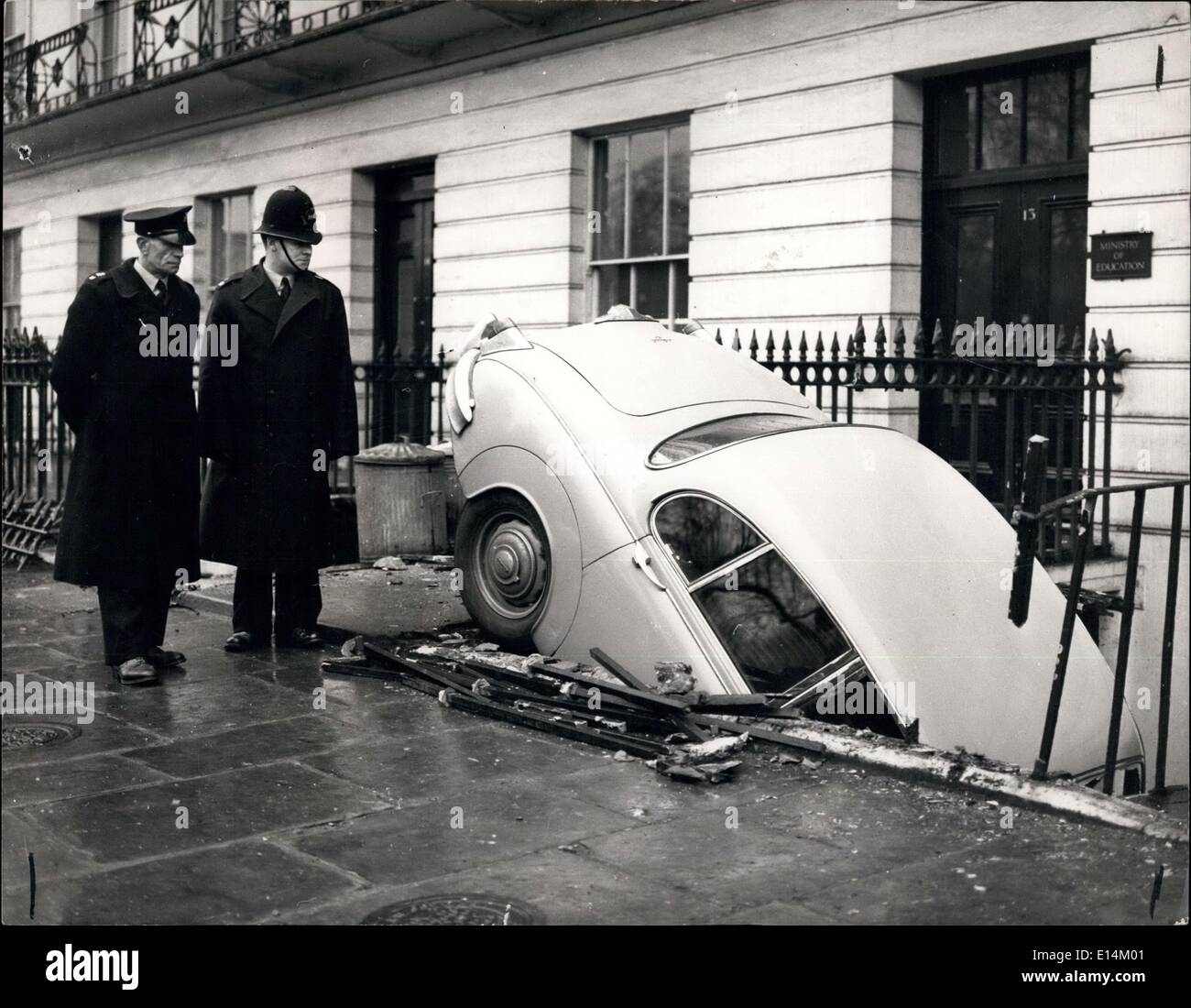 Apr. 05, 2012 - ''This is an example of what the Force call untidy parking''. This car forcing its way down the steps in London's flatland. Stock Photo