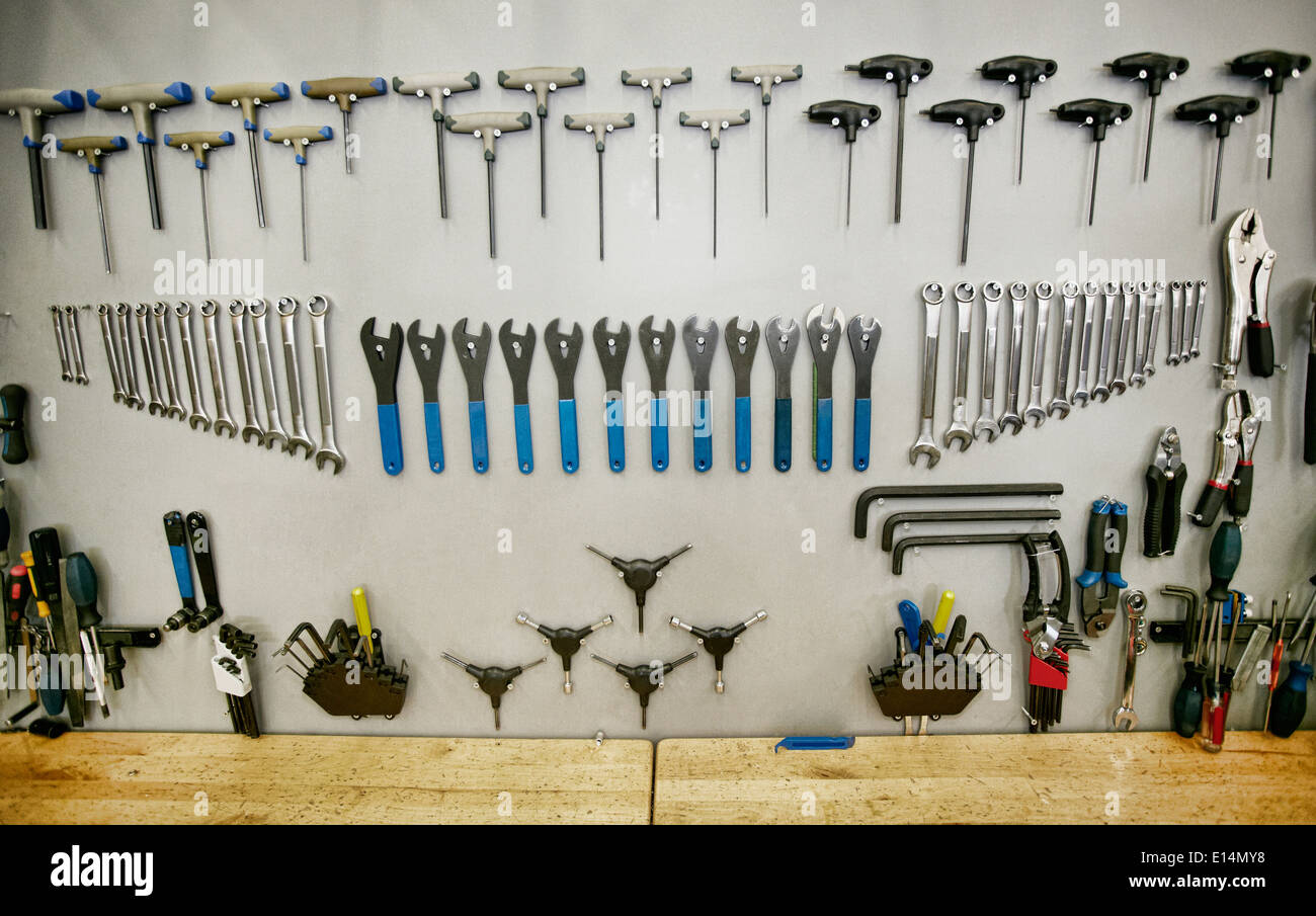 Tools arranged neatly on shop wall Stock Photo Alamy