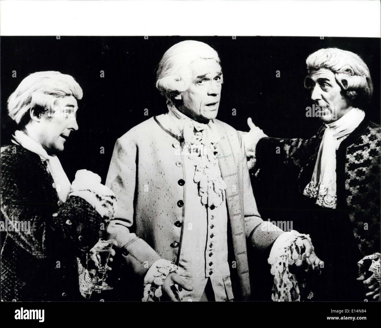 Apr. 05, 2012 - Paul Scofield in Amadeus at the the Olivier Theatre: The National Theatre production of Peter Shaffer's new play Amadeus at the Olivier Theatre, South Bank, London. Directed by Peter Hall with design and lighting by John Bury, music by Mozart and Salieri Photo shows Three of the cast L-R. Dermot Crowley (Venicello) Paul Scotfield (Antonio Salieri) and Donald Gee (Venticello) Stock Photo