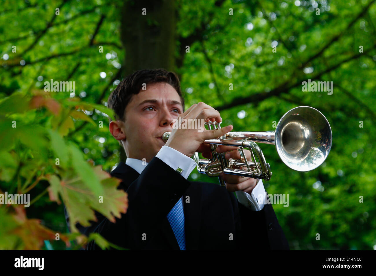 LONDON, ENGLAND, 22 May ,2014.  A bugle player plays the Last Post to mark the first anniversary of the murder of Fusilier Lee Rigby  near his Woolwich barracks. Credit:  David Horn/Alamy Live News Stock Photo