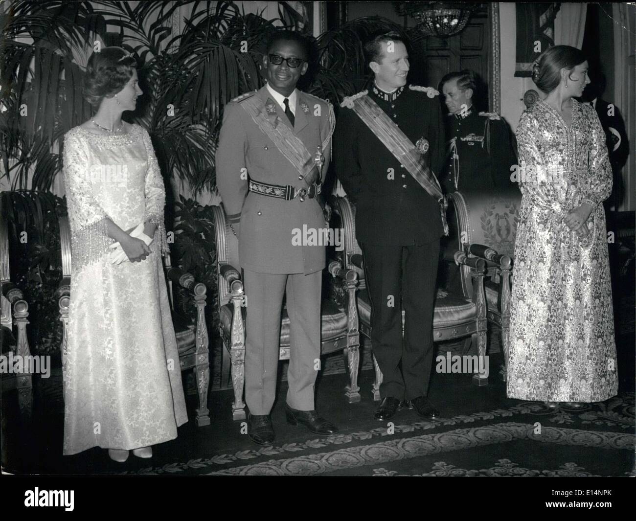 Apr. 09, 2012 - Mr. Mobutu, President of the Congo, was received for an official visit in Brussels. It was the first time that a President from the Congo visited Brussels officially since the independence of the country. The visit is destined to put an end to the tension that reigned between the two countries. The royal family of Brussels and Mobutu are pictured at a reception that was held in Mobutu's honor. Stock Photo