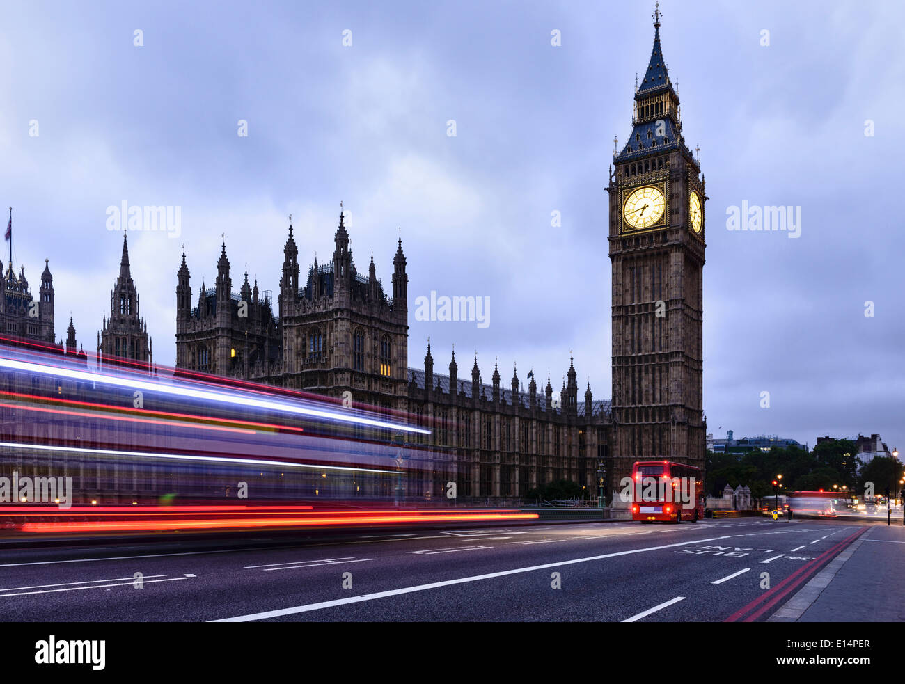 Time lapse view of bus passing Houses of Parliament, London, United Kingdom Stock Photo