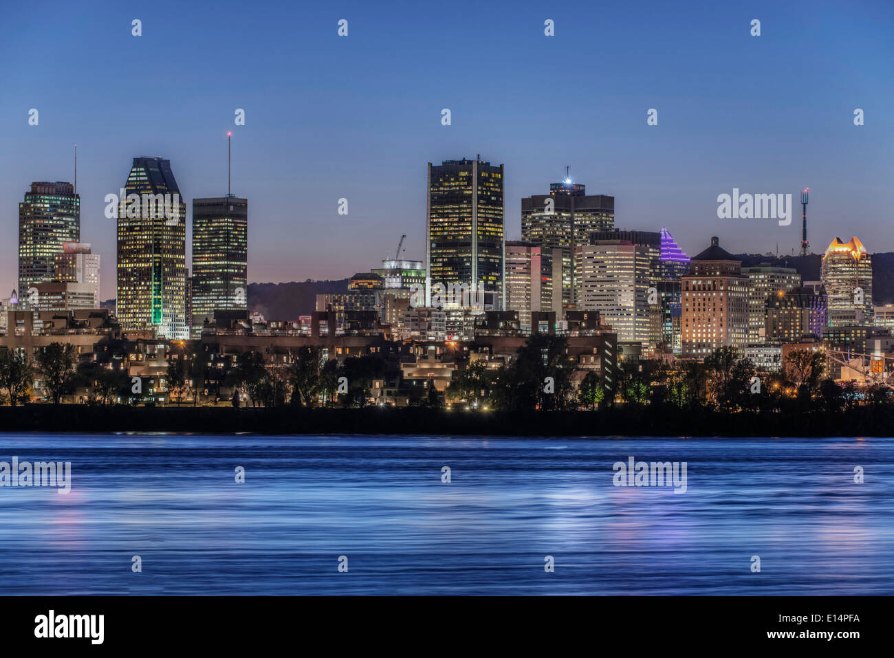 Montreal city skyline lit up at night, Quebec, Canada Stock Photo
