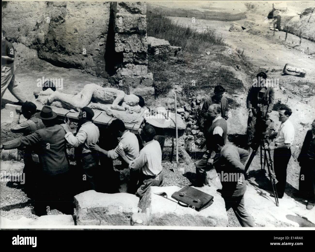 Apr. 18, 2012 - The B.B.C. film unit in action at Pompeii at the foot of Vesuvius. They are filming the Scene as a plaster cast Stock Photo