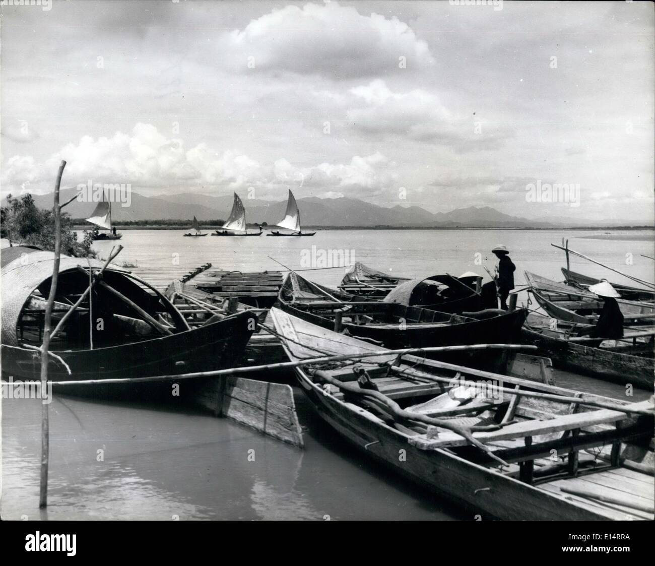 Apr. 18, 2012 - Sights and Scenes in Vietnam.: Once again the Far East is in trouble. American marines have landed in Siam and RAF fighters are standing by to fly out should there be a Communist invasion from nearby Laos. Neighbouring Laos is Vietnam and we present sights and scenes in this colourful country today. View of Maekong, looking across the River from Laos into Thailand. Stock Photo