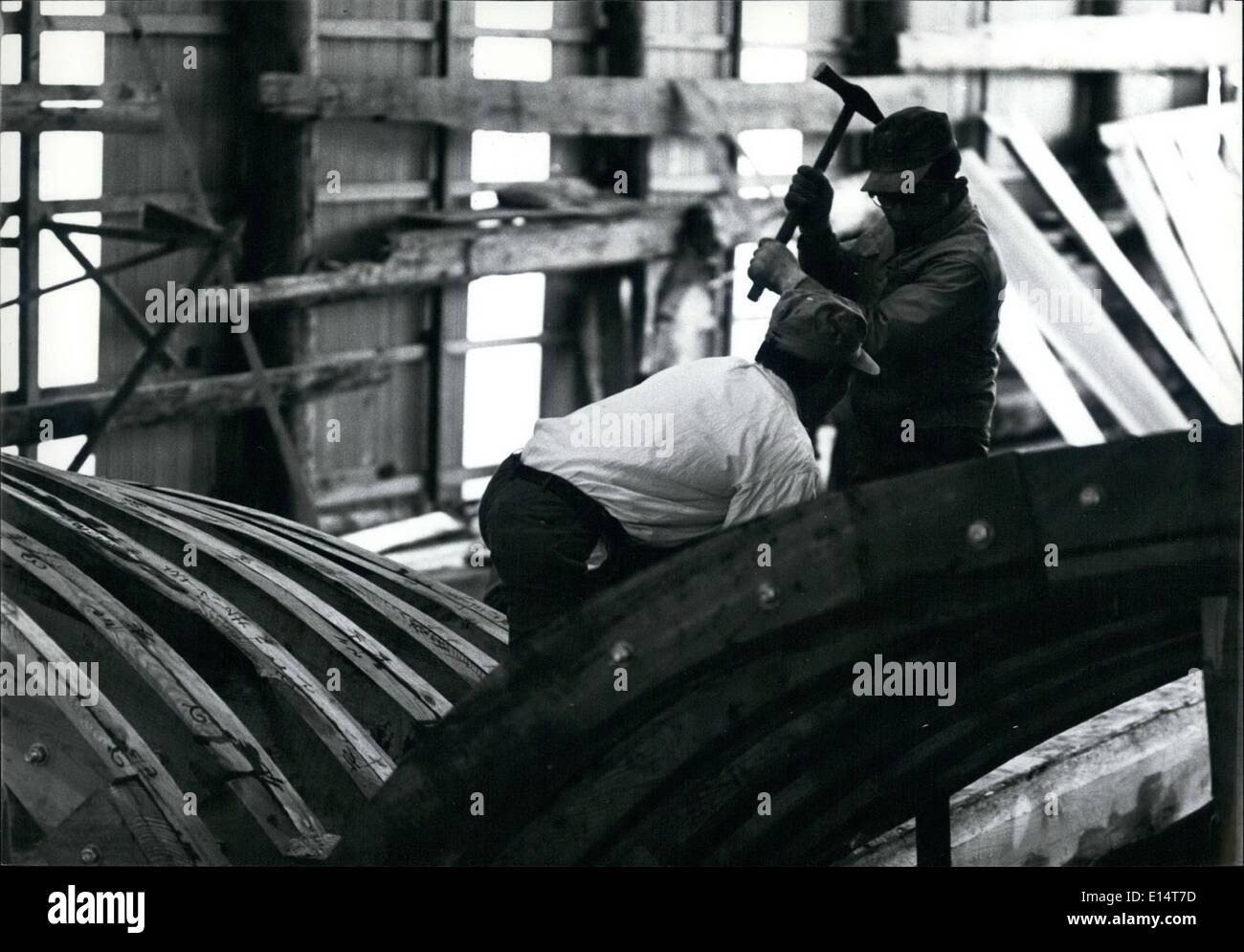 Apr. 18, 2012 - The keel of the boat being laid, nails of 30-40cms are used to rivet the pine ribs to the keel. Stock Photo