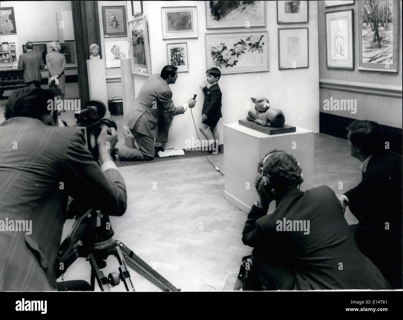 Apr. 18, 2012 - Little five-year old Lewis Lyons, stands by his painting as he faces the cine camera - at the Royal Academy today. Stock Photo